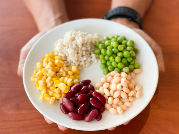 Colourful UK plate with varied vegetables, grains and protein sources